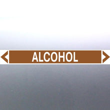 Load image into Gallery viewer, A rectangular pipe marker with the word 'ALCOHOL' in bold black lettering, Golden Tan background, and a white border.