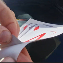 Load image into Gallery viewer, Hand holding playing cards with a blurred background