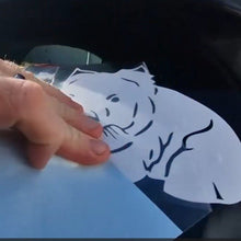 Load image into Gallery viewer, Hand holding a white tiger cutout on a blue surface