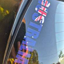 Load image into Gallery viewer, Reflective 'AUSTRALIA' decal with Australian flag colors on a car window.