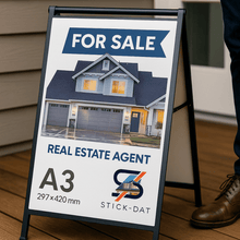 Load image into Gallery viewer, Real estate 'For Sale' sign on a stand with a house illustration and text.
