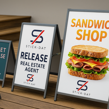 Load image into Gallery viewer, Set of sandwich shop signs with branding and promotional text on a wooden surface.