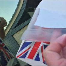 Load image into Gallery viewer, Person holding a clear allocation tape with a Union Jack design, australuan flag decal