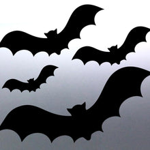 Load image into Gallery viewer, A set of four black vinyl stickers in varying sizes designed to create a bat silhouette pattern.