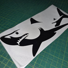 Load image into Gallery viewer, Black shark decal on a white sheet with a green cutting mat background