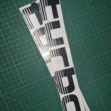 Load image into Gallery viewer, Turbo decal on a green cutting mat