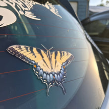 Load image into Gallery viewer, Butterfly decal on a car window with a blurred background