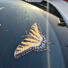 Load image into Gallery viewer, Butterfly decal on a car window with a dark background