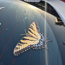 Load image into Gallery viewer, Butterfly decal on a car window with a dark background