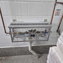 Load image into Gallery viewer, Metal stand with wire mesh top against a tiled wall