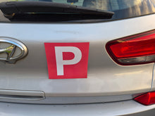 Load image into Gallery viewer, Car with a red 'P' plate Magnets on the back, indicating a Provisional driver.