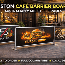 Load image into Gallery viewer, Custom café barrier boards with branding and product images in front of a café.