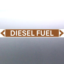 Load image into Gallery viewer, A self-adhesive diesel fuel pipe marker with a golden tan background and bold black lettering that reads 'DIESEL FUEL' with a white contrasting border.