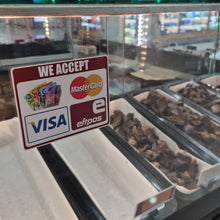Load image into Gallery viewer, Display case with food items and a sign indicating accepted payment methods.
