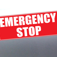 Load image into Gallery viewer, A rectangular red emergency stop Sticker/sign with bold white text reading 'EMERGENCY STOP' on a dark gray background.
