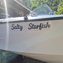 Load image into Gallery viewer, Boat with 'Salty Starfish' decal on a sunny day in Australia