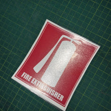 Load image into Gallery viewer, Fire extinguisher sign on a green grid background