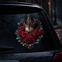 Load image into Gallery viewer, Decorative decal of roses and a crown on a car's rear window at night.
