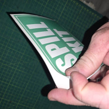 Load image into Gallery viewer, Hand holding a 'Spill Kit' sign on a green cutting mat.