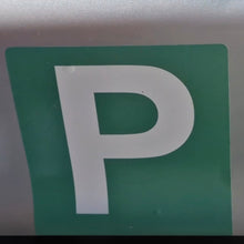 Load image into Gallery viewer, Close-up of a green parking sign with a white 'P'.