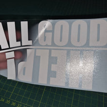 Load image into Gallery viewer, Decal with 'ALL GOOD THINGS' text held over a cutting mat