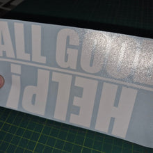 Load image into Gallery viewer, Vinyl decal with text held over a cutting mat