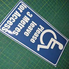 Load image into Gallery viewer, Handicap access sign with text on a green grid background