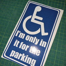 Load image into Gallery viewer, Handicap parking sign with humorous text on a green cutting mat