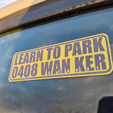 Load image into Gallery viewer, Yellow and purple 'LEARN TO PARK 0408 WAN KER' sticker on a car window.