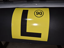 Load image into Gallery viewer, Yellow and black traffic sign with number 90 on a dark surface