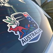 Load image into Gallery viewer, Ned Kelly Australia-themed car decal with kangaroo and Australian flag on a vehicle window.