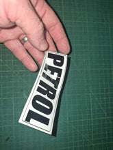 Load image into Gallery viewer, Hand holding a 'PETROL' decal on a green cutting mat for a fuel tank