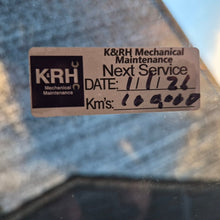 Load image into Gallery viewer, Real customers logo on our service due stickers, custom made to order for K&RH Mechanical Maintenance sticker on a car window with service details.