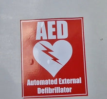Load image into Gallery viewer, AED (Automated External Defibrillator) sign on a wall