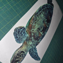 Load image into Gallery viewer, Colorful turtle illustration on a white card with grid background