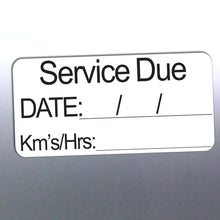 Load image into Gallery viewer, Service due label with fields for date and kilometers on a metallic background