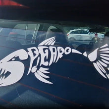 Load image into Gallery viewer, White fish skeleton decal on a car window with 'SPREARO' text.