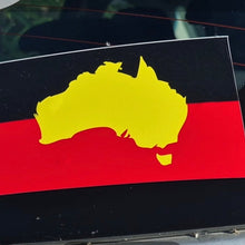 Load image into Gallery viewer, Sticker of Australia with red, yellow, and black colors on a dark surface