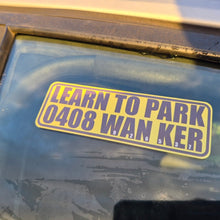 Load image into Gallery viewer, Sticker on a car window with text 'LEARN TO PARK 0408 WAN KER' on a reflective surface.