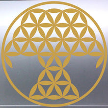 Load image into Gallery viewer, Tree Of Life Gold geometric flower of life symbol on a reflective silver surface
