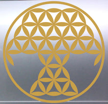 Load image into Gallery viewer, Tree Of Life Gold geometric flower of life symbol on a reflective silver surface