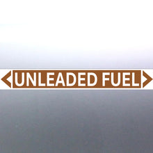 Load image into Gallery viewer, A pipe marker sign with the text 'UNLEADED FUEL' in bold black lettering on a golden tan background with a white border and green arrows indicating flow direction.