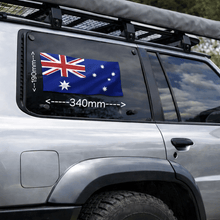 Load image into Gallery viewer, Silver SUV with Australian flag decal on window, surrounded by natural scenery