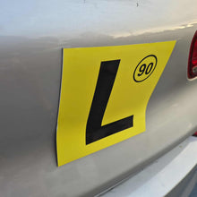 Load image into Gallery viewer, Yellow L plate on a car's rear, indicating a learner driver 90kms design.