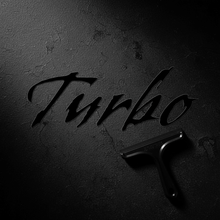 Load image into Gallery viewer, Black Gothic Turbo sticker overhead flat lay with squeegee