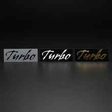 Load image into Gallery viewer, Black, white and gold Gothic Turbo stickers side by side