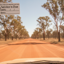 Load image into Gallery viewer, Booby sticker on dusty 4WD windscreen outback