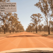 Load image into Gallery viewer, Booby sticker on dusty 4WD windscreen outback