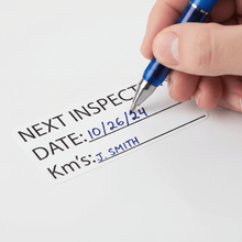 Load image into Gallery viewer, Close-up of hand writing inspection date in ballpoint pen