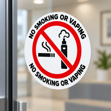Load image into Gallery viewer, Close-up of no smoking or vaping sticker on glass